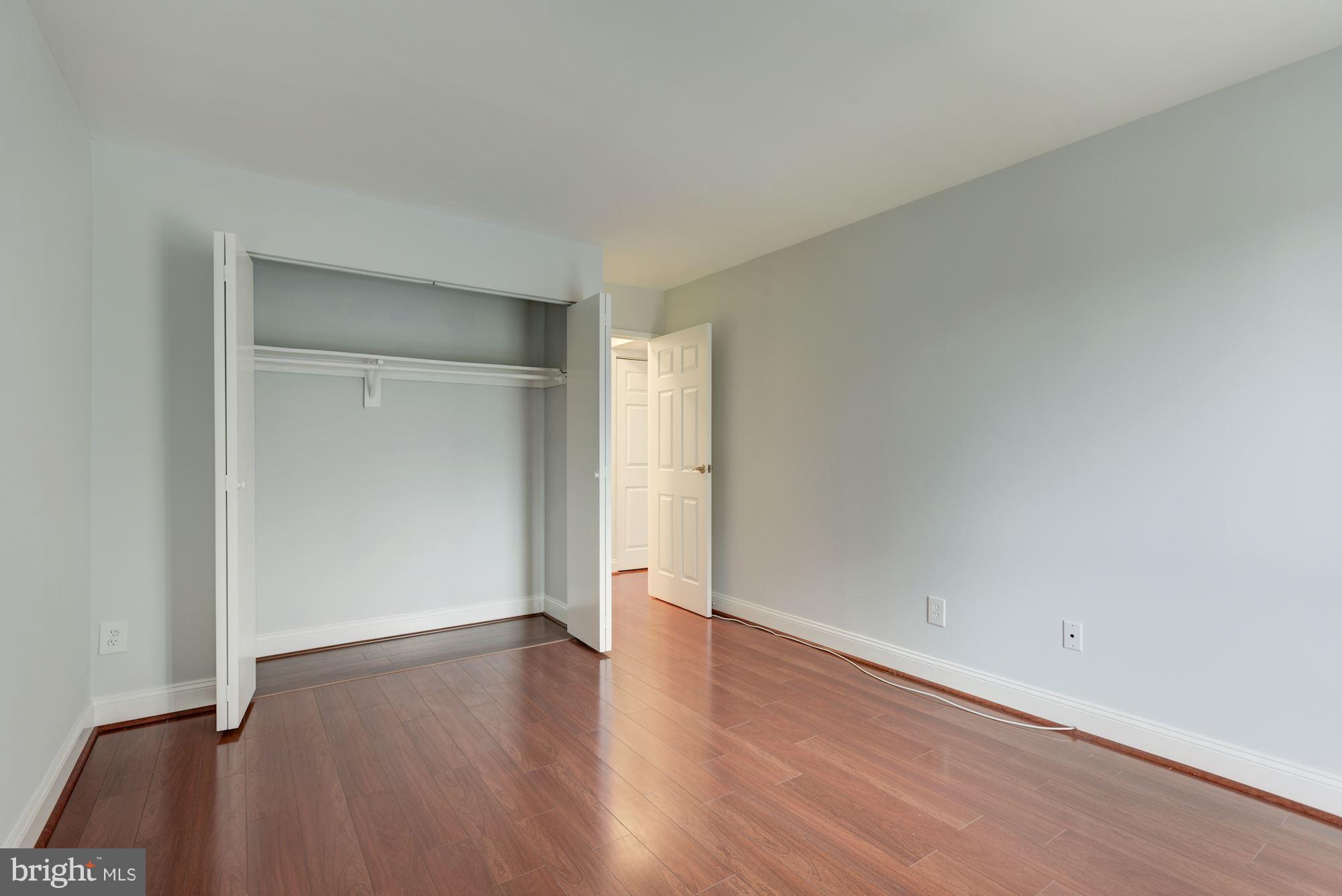 2018 Colts Neck Road, Unit 22 Reston, VA 20191 - Photo 15 of 26 Wood Floors in Bedrooms