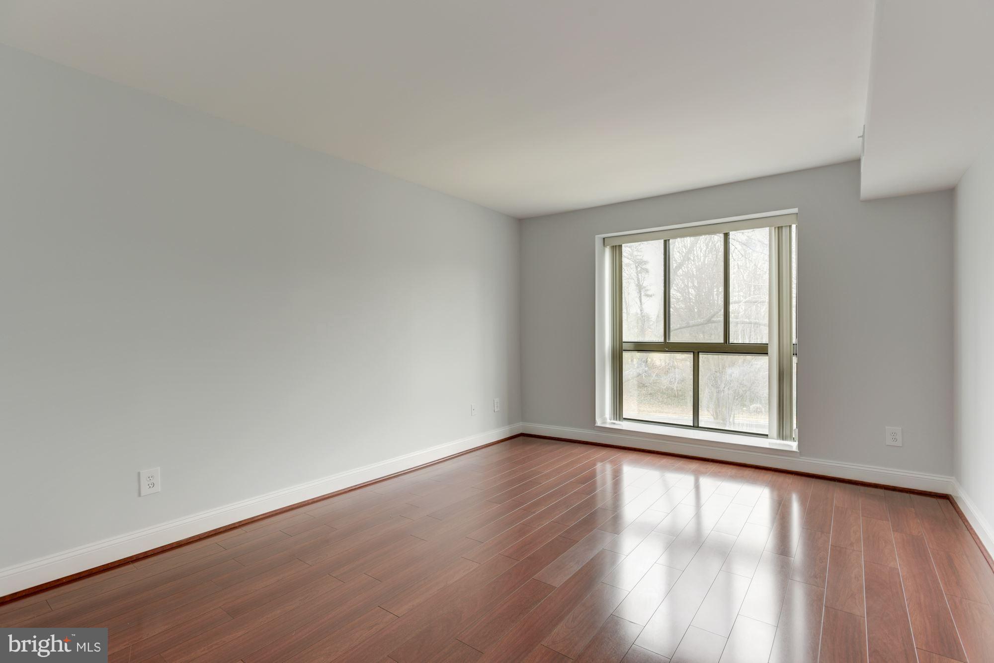 2018 Colts Neck Road, Unit 22 Reston, VA 20191 - Photo 16 of 26 Wood Floors in Bedrooms
