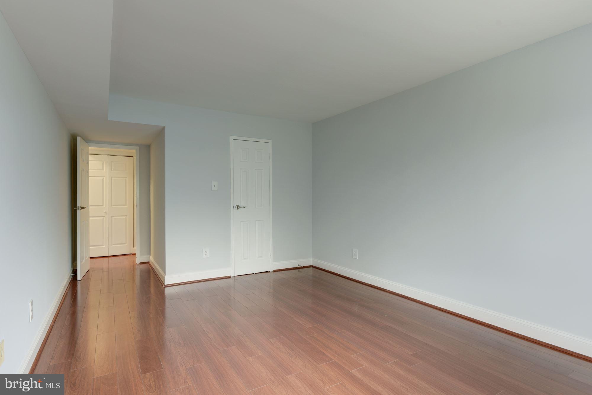 2018 Colts Neck Road, Unit 22 Reston, VA 20191 - Photo 17 of 26 Wood Floors in Bedrooms