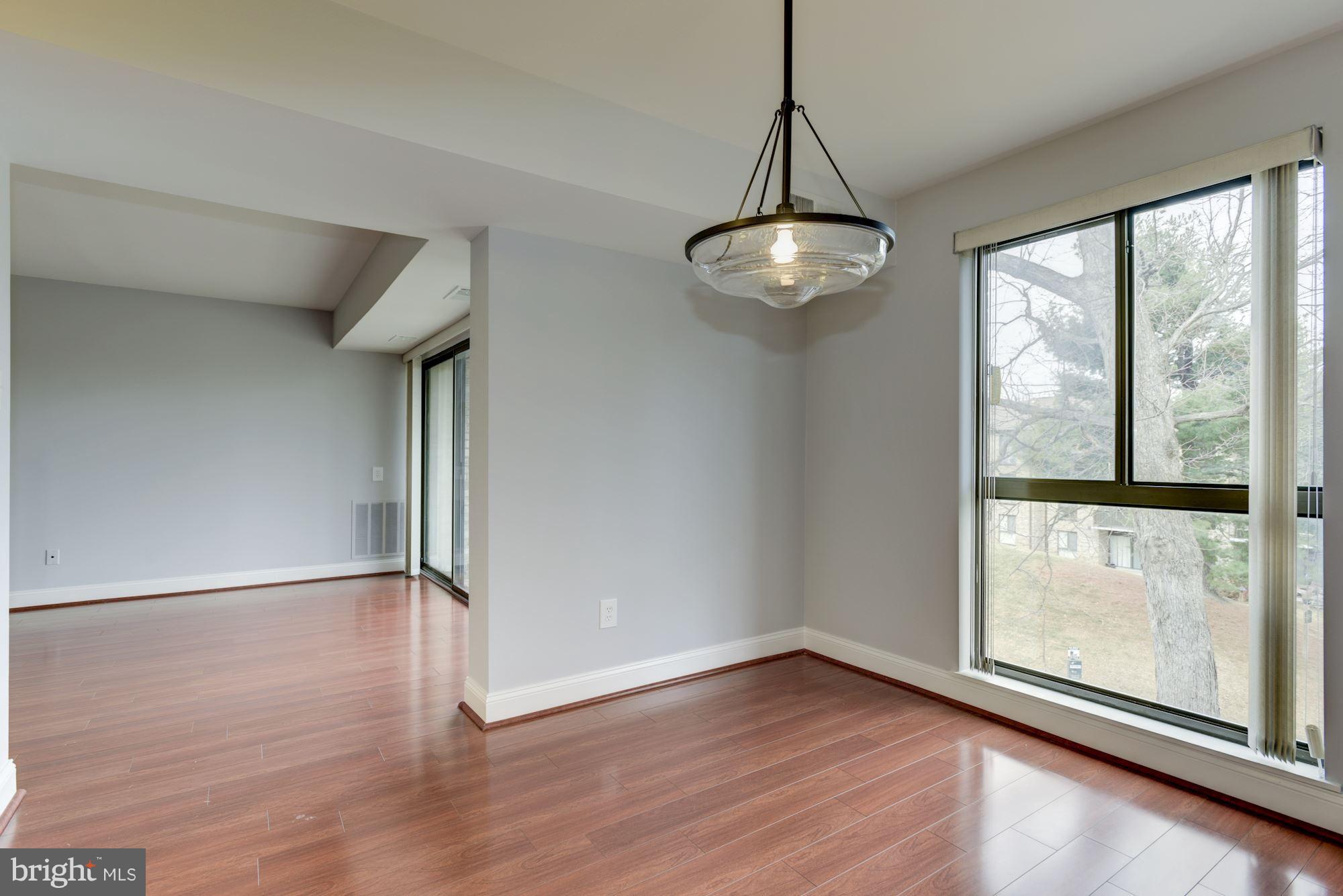 2018 Colts Neck Road, Unit 22 Reston, VA 20191 - Photo 7 of 26 Dining Room with views of open space.