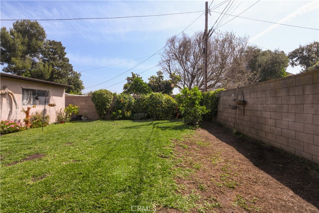 4616 North Roxburgh Avenue Covina, CA 91722 - Photo 20 of 23 a backyard of a house with lots of green space