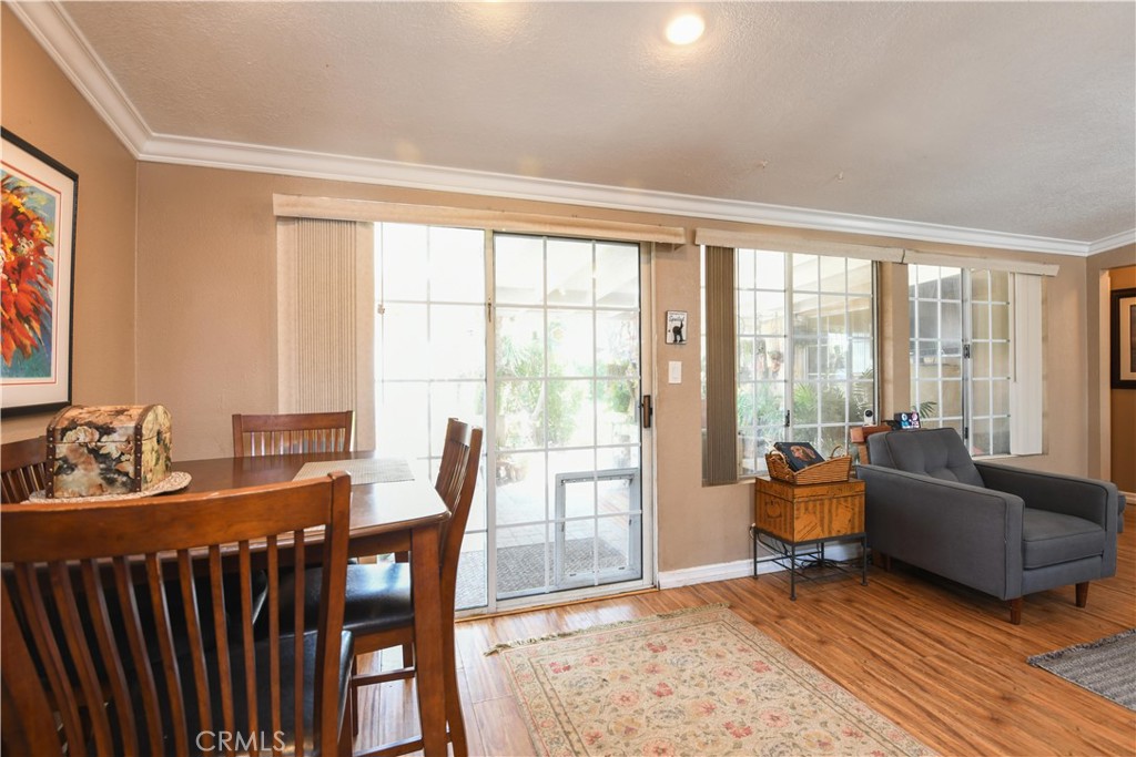 4616 North Roxburgh Avenue Covina, CA 91722 - Photo 6 of 23 a living room with furniture and large windows
