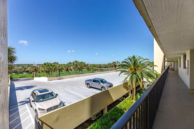 a picture of a flower in a balcony