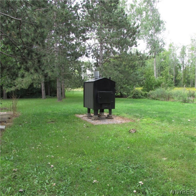 3282 Coomer Road Newfane, NY 14108 - Photo 25 of 25 Exterior auxiliary wood heat source