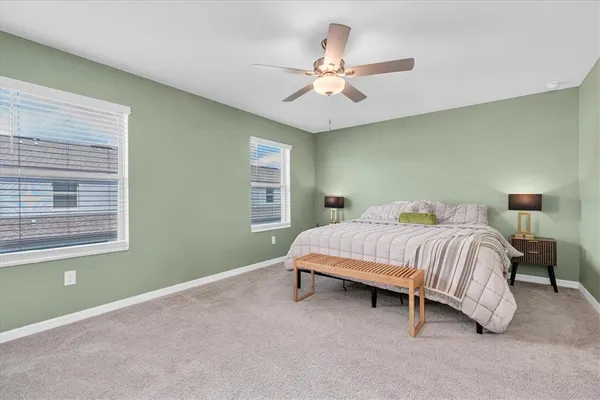 a bed room with a bed and a couch