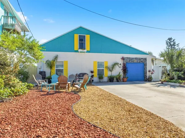 a front view of a house with patio