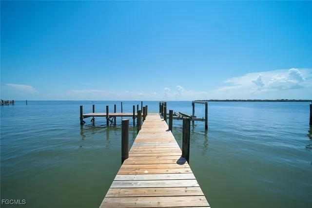 a view of wooden floor with a lake view