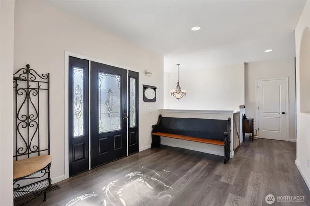 a bedroom with a bed and a walk in closet