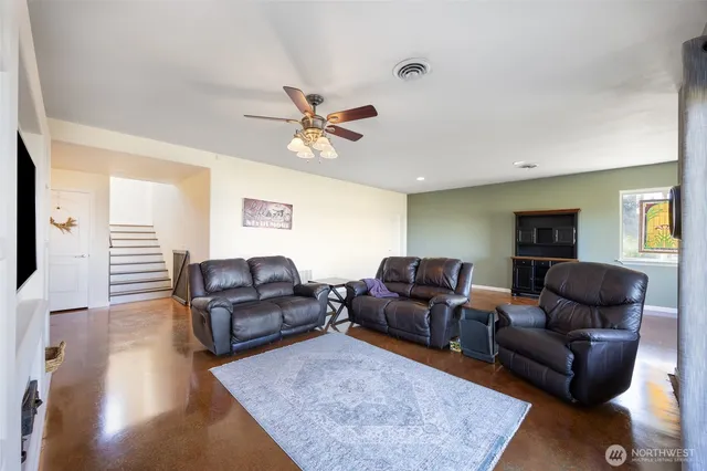a living room with furniture and a couch