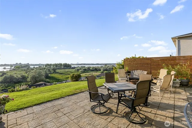 a view of a chairs and table in the terrace