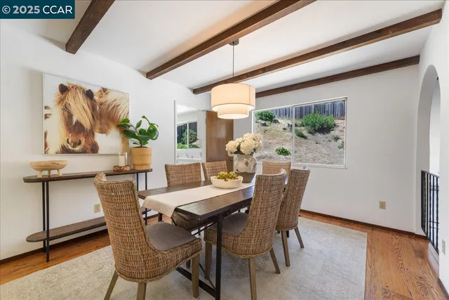 a kitchen with stainless steel appliances a refrigerator sink and cabinets