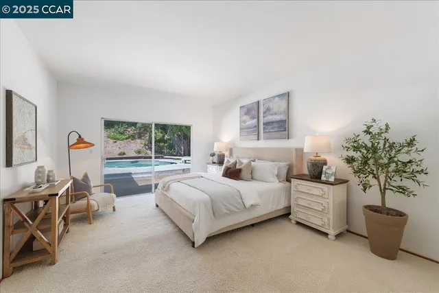 a bedroom with a bed and a cabinets