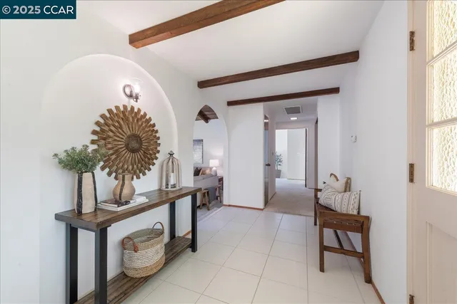 a view of a livingroom with furniture and a table