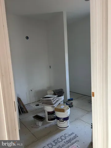 a close view of dining table and chairs