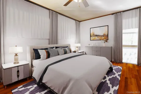 a spacious bedroom with a bed and wooden floor