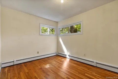a bedroom with a bed and a desk