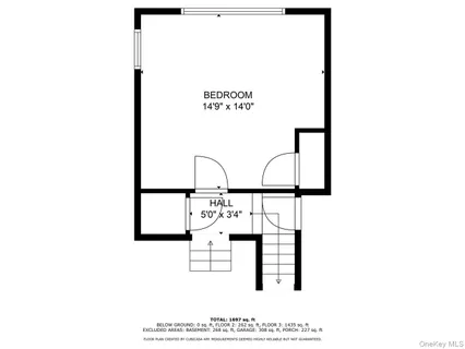 a picture of a bench in front of a wall