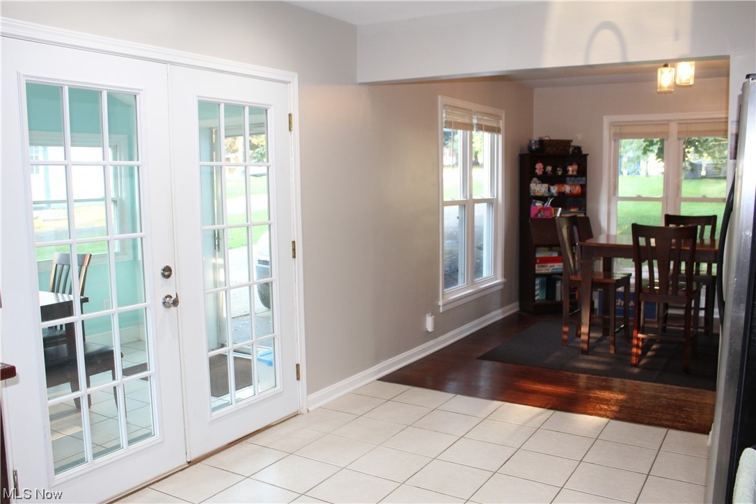 1810 Massillon Road Akron, OH 44312 - Photo 27 of 31 Tiled dining room featuring french doors