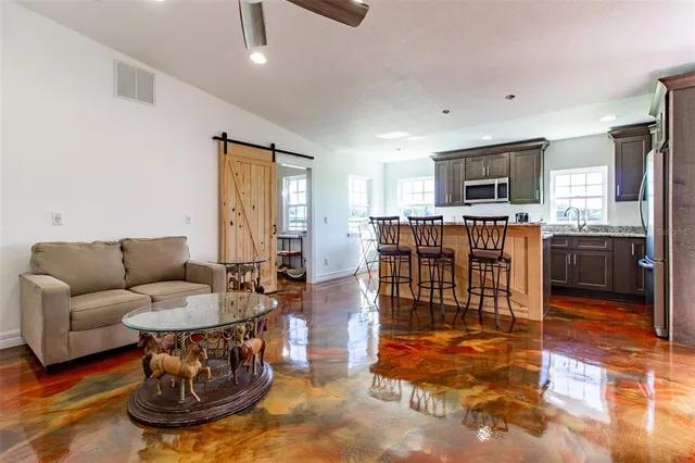 a view of swimming pool with a yard