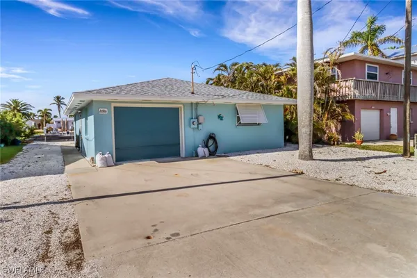 a view of a house with a garage