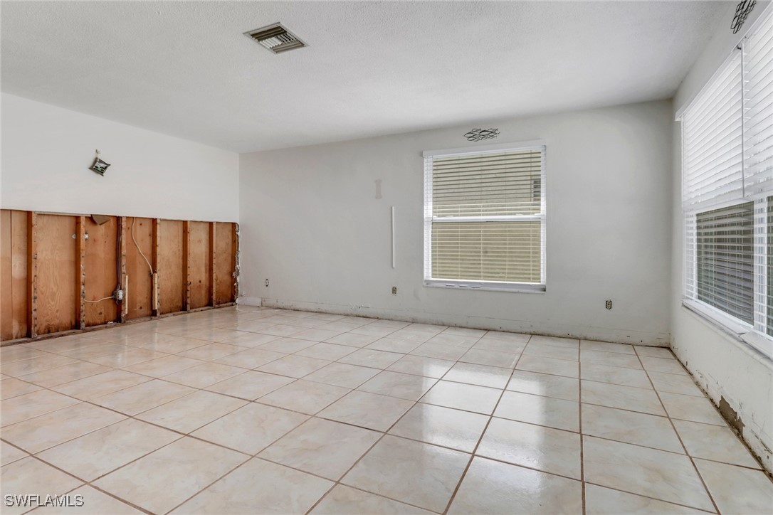 2686 Clyde Street Matlacha, FL 33993 - Photo 14 of 36 a view of an empty room with a window