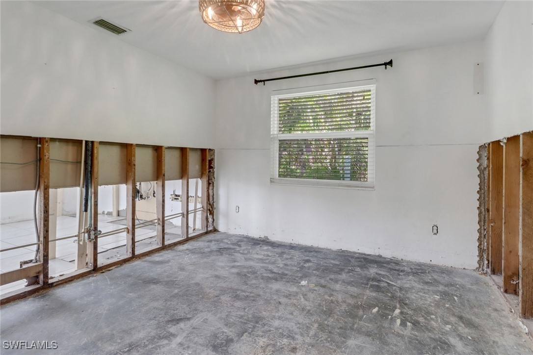 2686 Clyde Street Matlacha, FL 33993 - Photo 22 of 36 a view of an empty room with a window