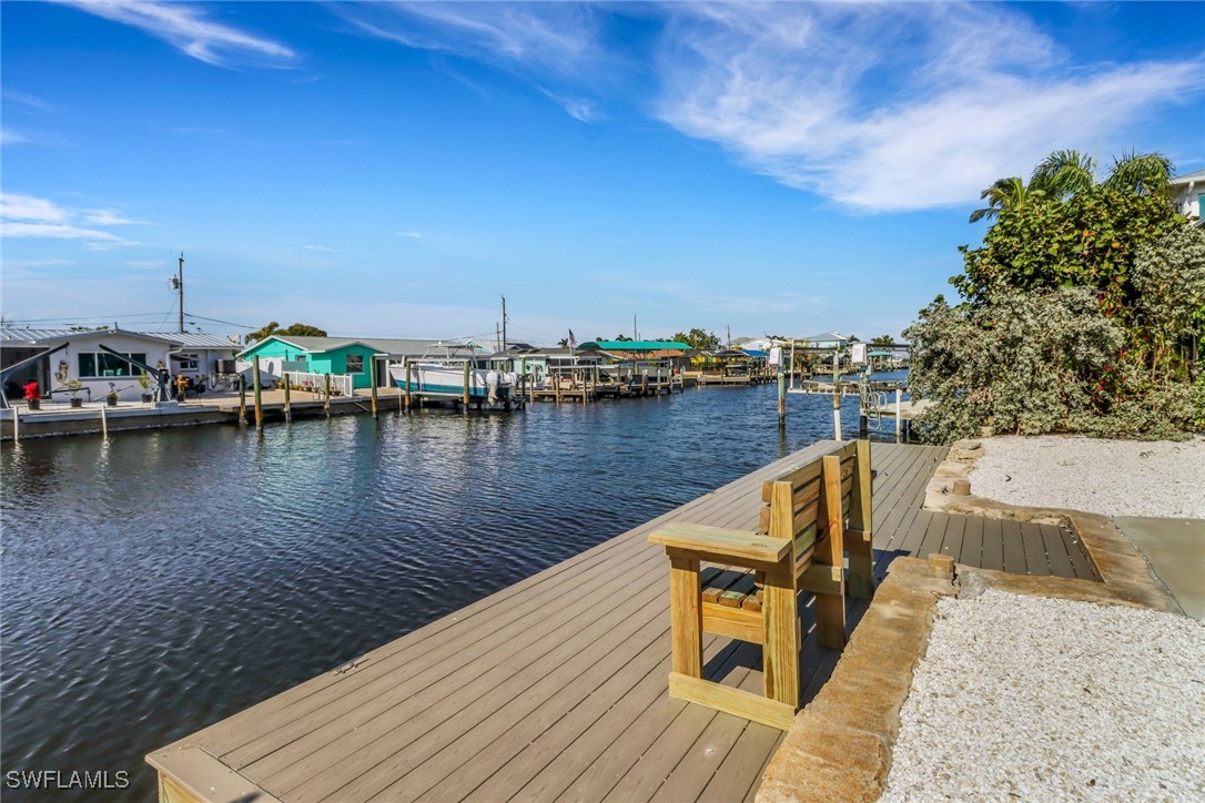 2686 Clyde Street Matlacha, FL 33993 - Photo 5 of 36 a view of a lake with houses
