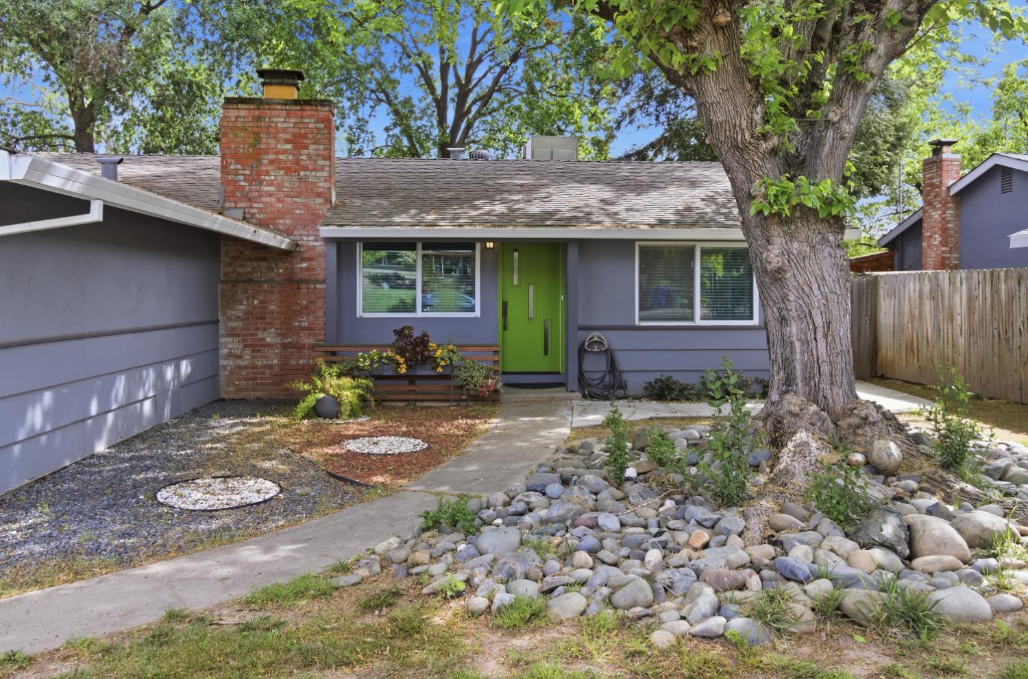5262 Flagstone Street Carmichael, CA 95608 - Photo 14 of 31 a front view of a house with garden