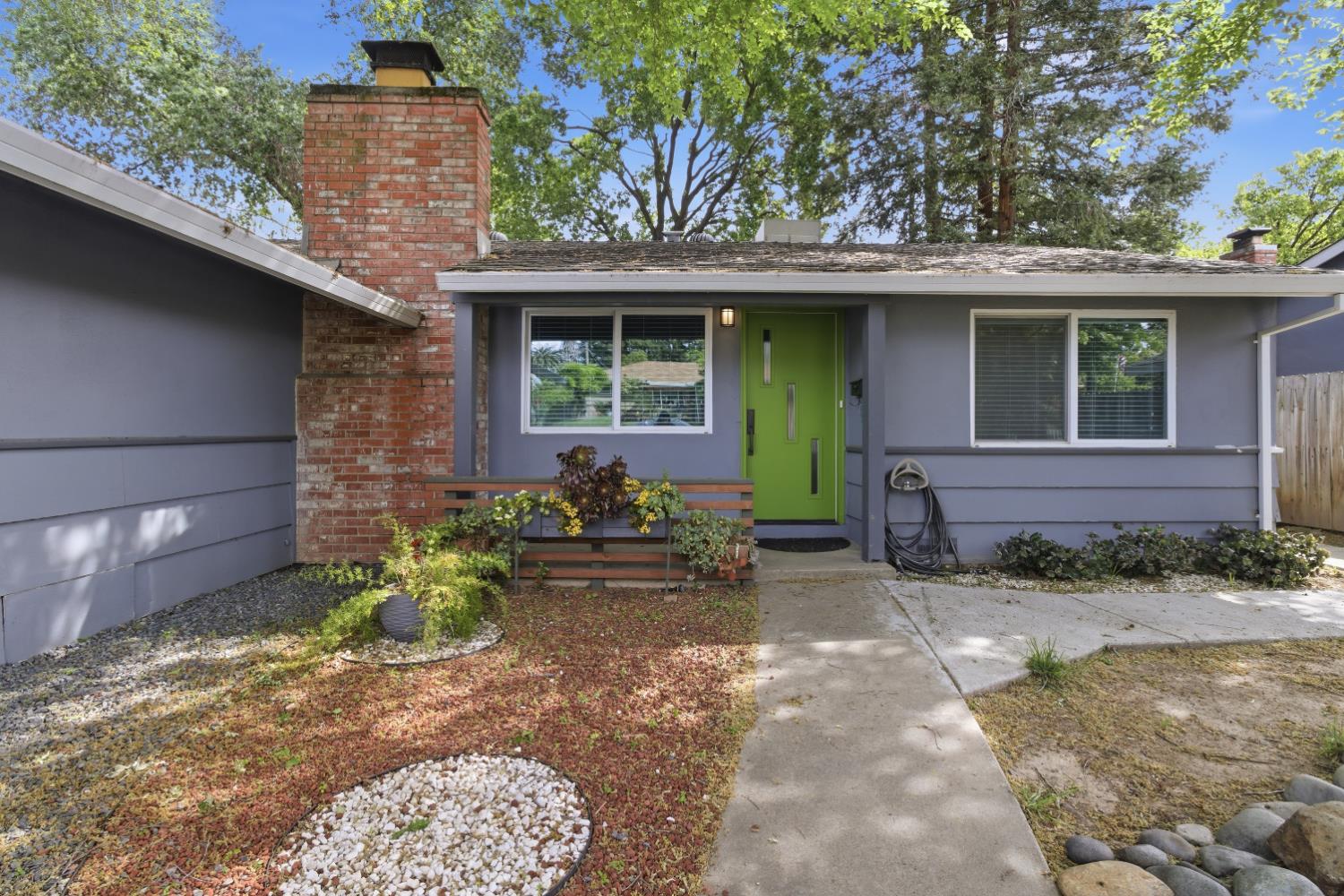 5262 Flagstone Street Carmichael, CA 95608 - Photo 16 of 31 a front view of a house with garden