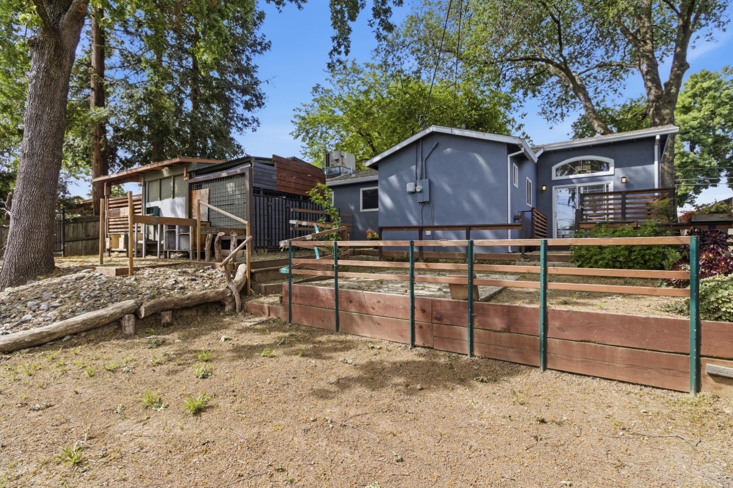 5262 Flagstone Street Carmichael, CA 95608 - Photo 19 of 31 a view of a house with wooden fence