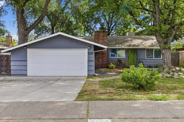 a front view of house with yard