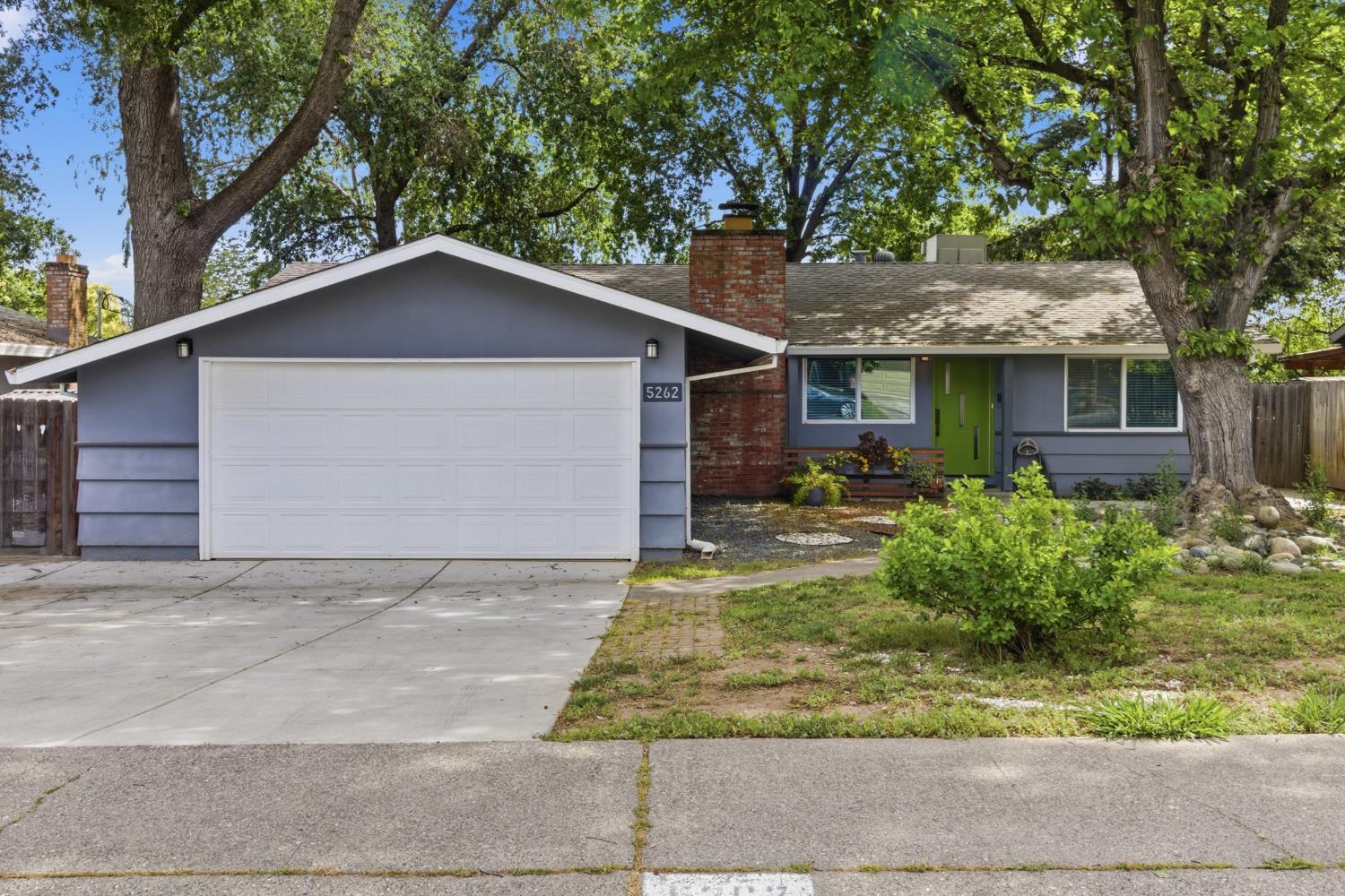 5262 Flagstone Street Carmichael, CA 95608 - Photo 2 of 31 a front view of house with yard