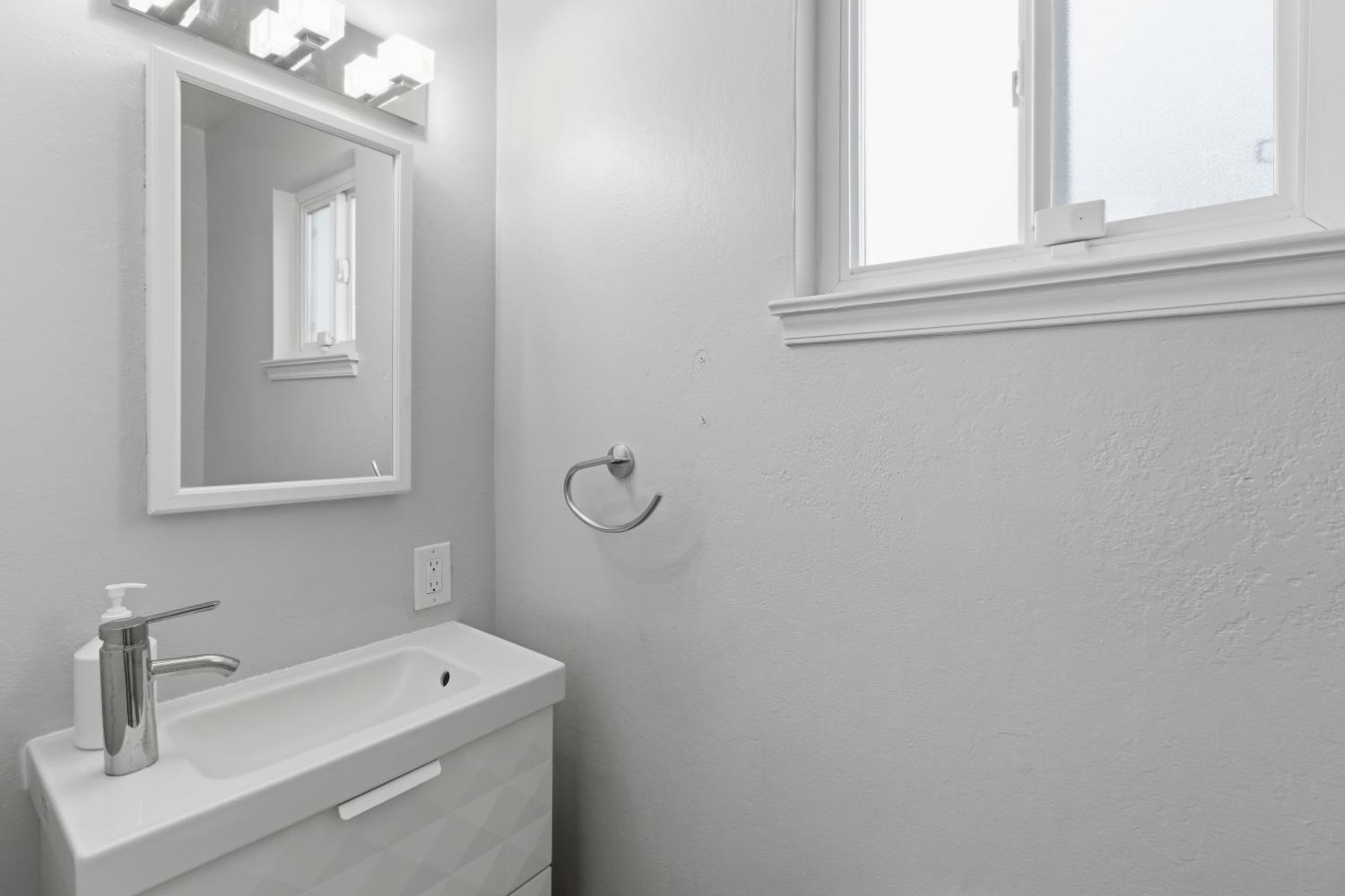 5262 Flagstone Street Carmichael, CA 95608 - Photo 27 of 31 a bathroom with a sink and a window