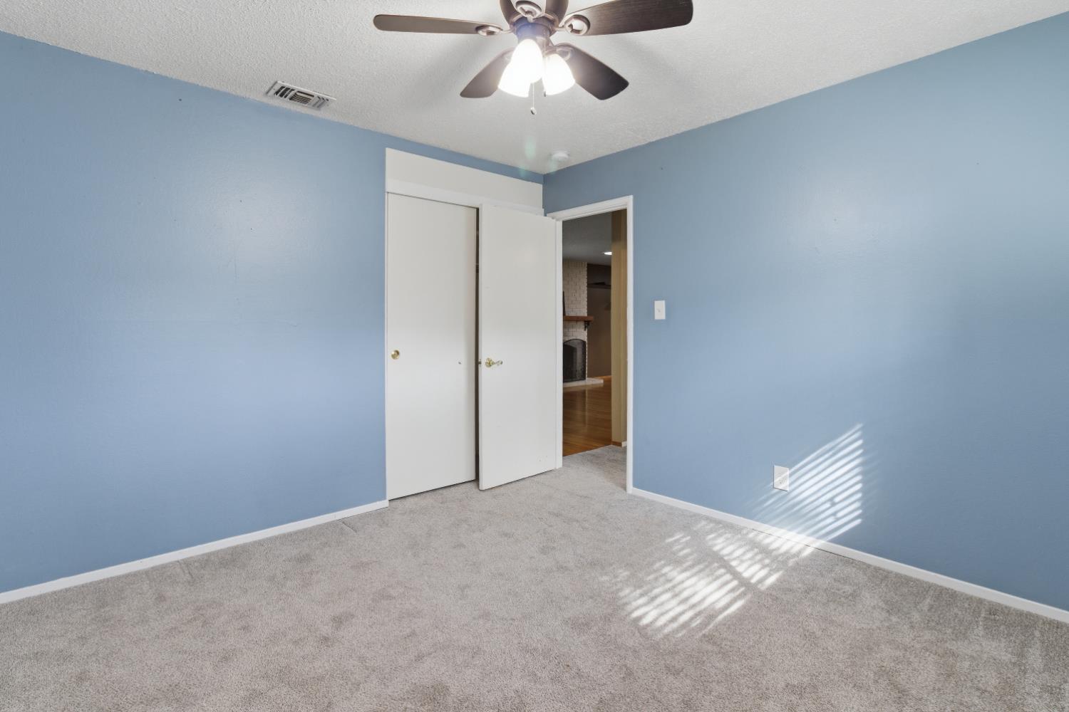 5262 Flagstone Street Carmichael, CA 95608 - Photo 28 of 31 a view of an empty room with a window