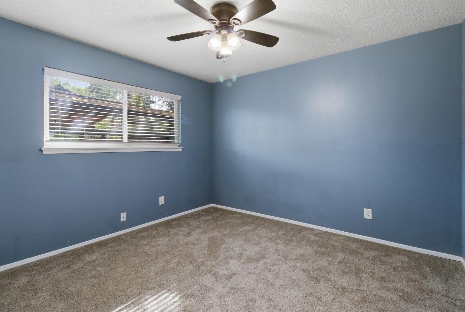 5262 Flagstone Street Carmichael, CA 95608 - Photo 29 of 31 a view of an empty room with a window