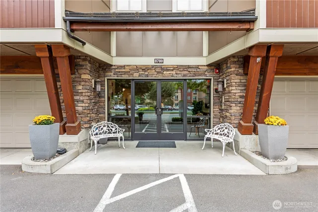 a view of patio with dining table and chairs