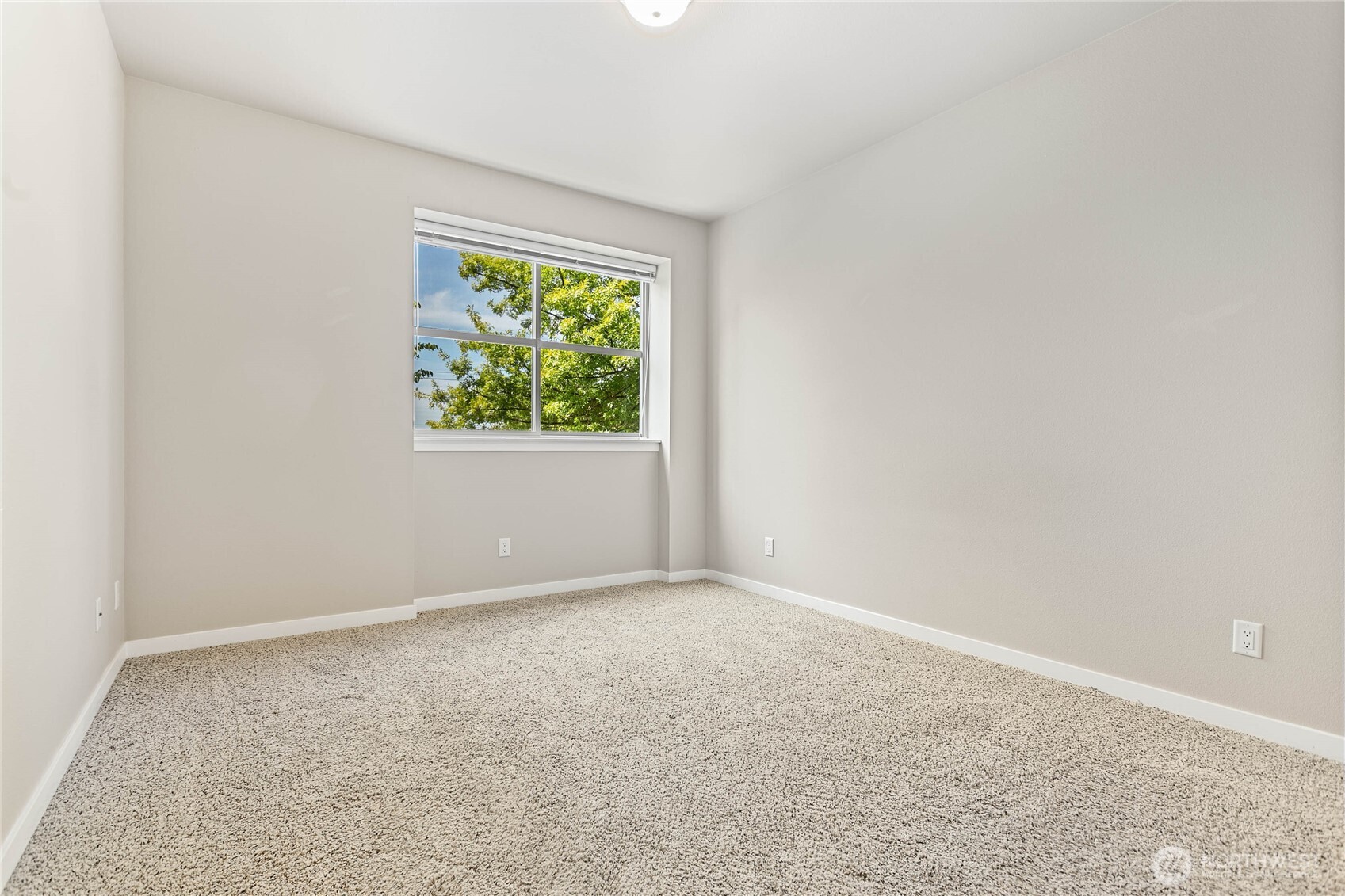 8780 Depot Road, Unit 207 Lynden, WA 98264 - Photo 17 of 37 an empty room with windows