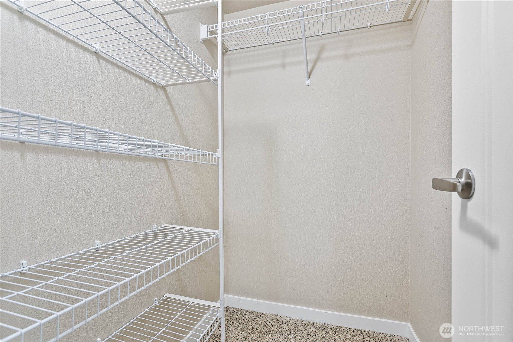 8780 Depot Road, Unit 207 Lynden, WA 98264 - Photo 23 of 37 a view of a room with racks on the wall