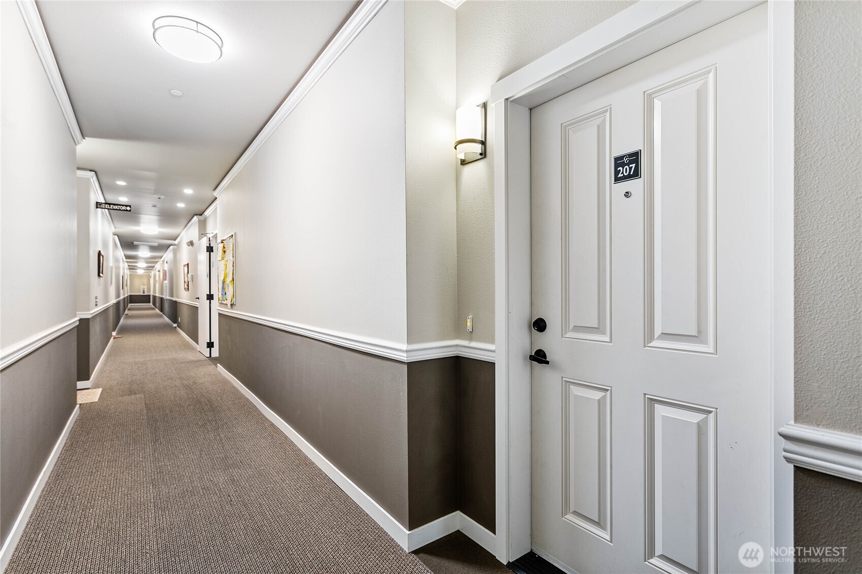 8780 Depot Road, Unit 207 Lynden, WA 98264 - Photo 28 of 37 wooden floor with an entryway