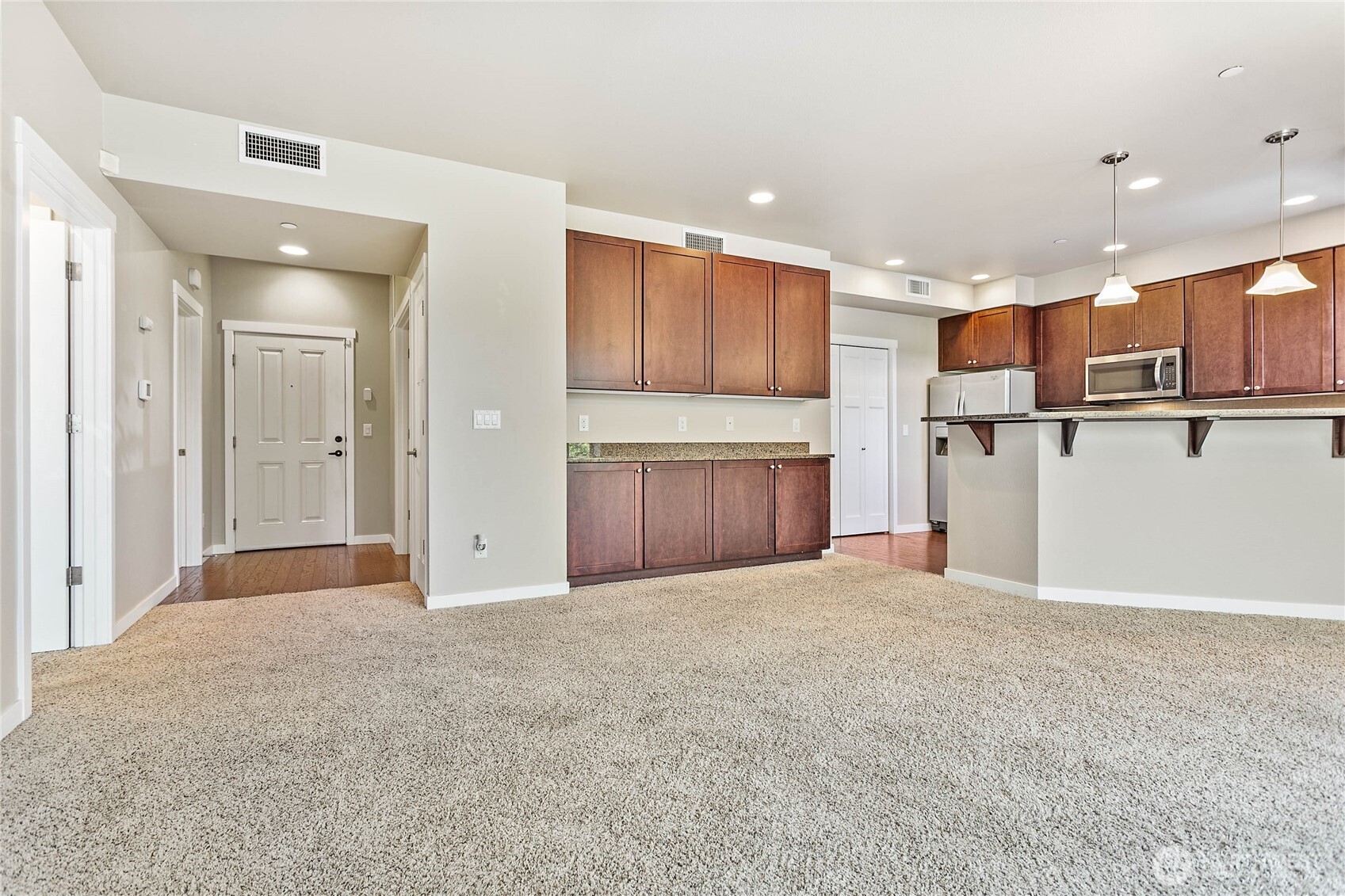 8780 Depot Road, Unit 207 Lynden, WA 98264 - Photo 4 of 37 a view of kitchen with refrigerator and a sink