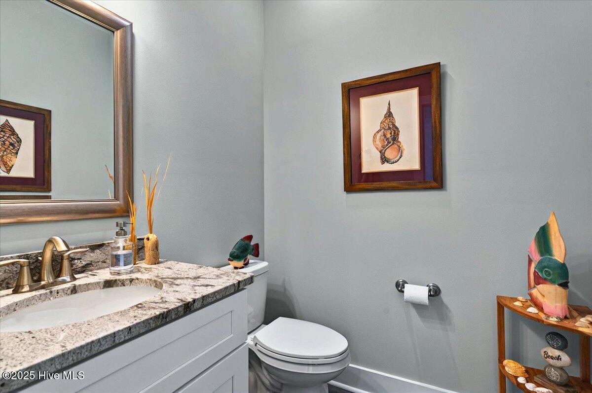 550 Barber Road Southport, NC 28461 - Photo 29 of 64 Downstairs Powder Room