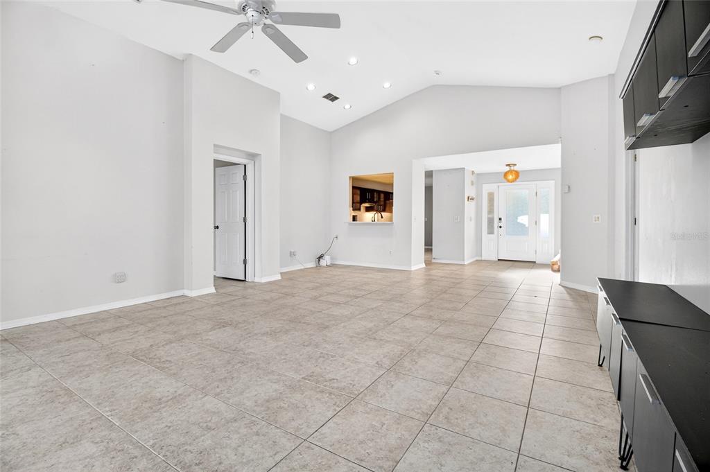 2250 Chase Court Mount Dora, FL 32757 - Photo 16 of 46 a view of a livingroom with a staircase