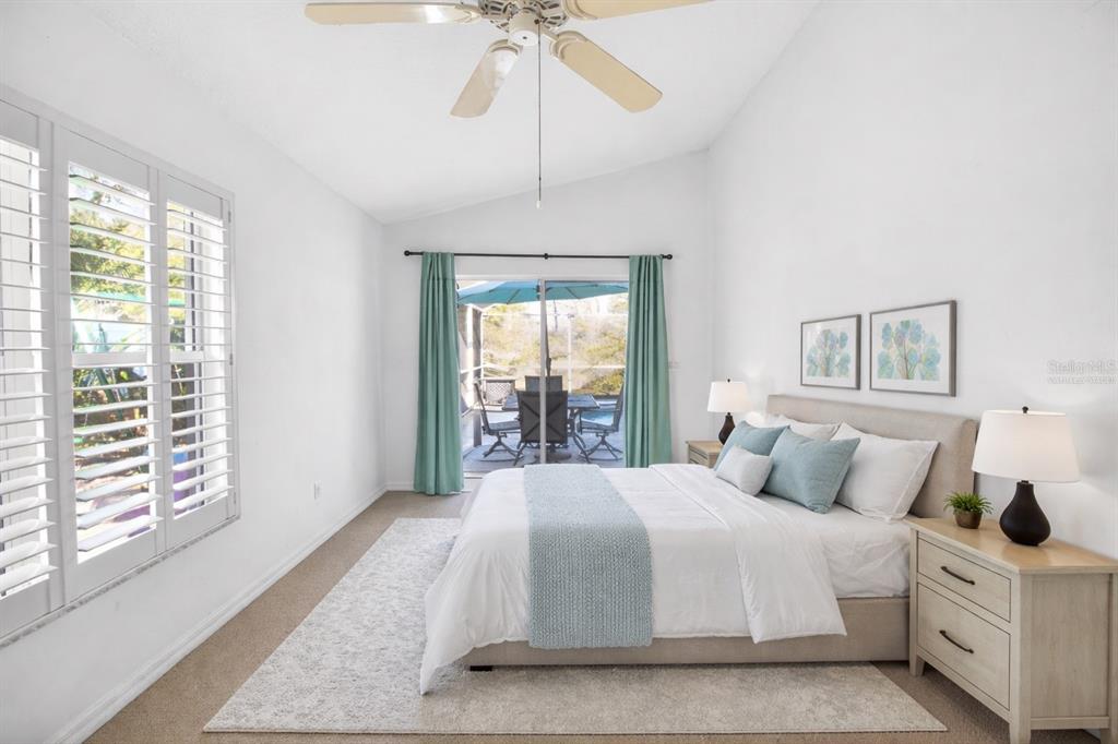 2250 Chase Court Mount Dora, FL 32757 - Photo 19 of 46 a bedroom with a large bed and a window