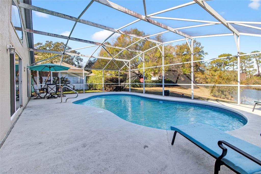 2250 Chase Court Mount Dora, FL 32757 - Photo 32 of 46 a view of a room with wooden floor