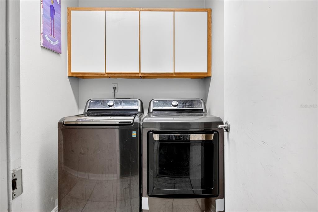 2250 Chase Court Mount Dora, FL 32757 - Photo 33 of 46 a utility room with dryer and washer