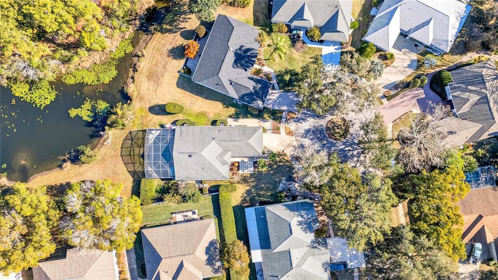 2250 Chase Court Mount Dora, FL 32757 - Photo 44 of 46 an aerial view of residential houses with outdoor space