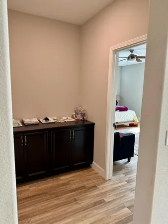 a bathroom with a double vanity sink and mirror
