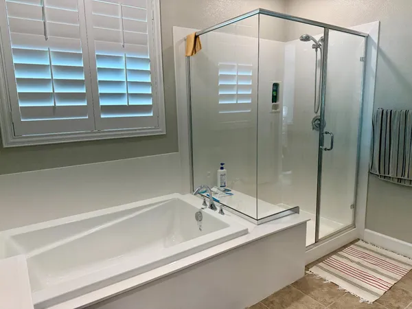 a view of hallway with wooden floor