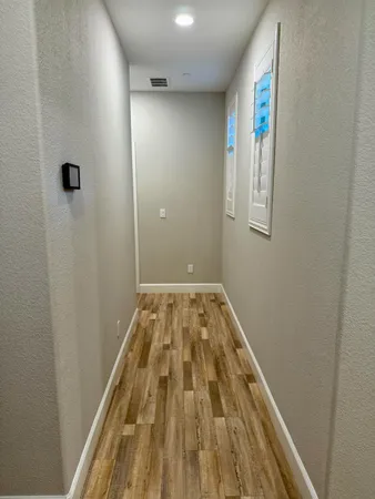 an aerial view of a residential houses with outdoor space