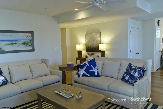 a living room with furniture and a couch